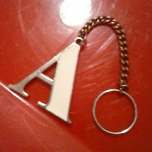 An Artistic A Key Chain Copper Painted Metal